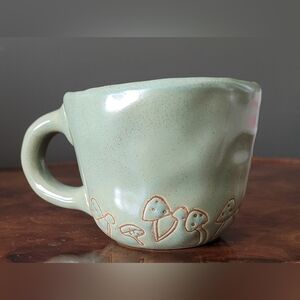 Urban Outfitters ' Flower' Mug With Mushroom Design.